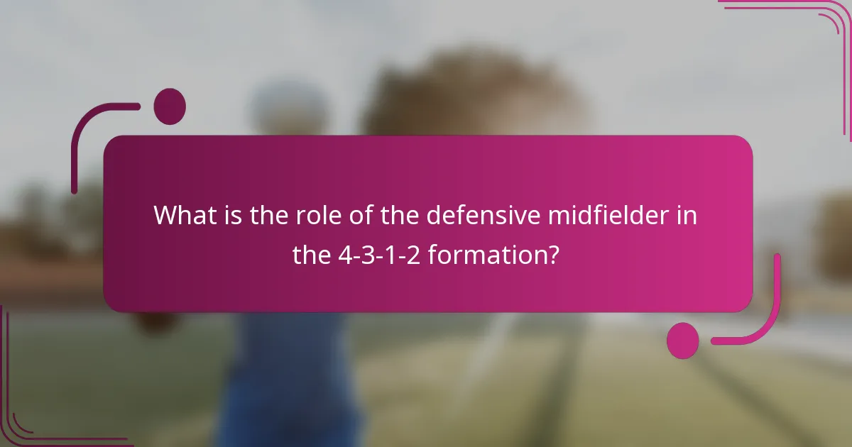 What is the role of the defensive midfielder in the 4-3-1-2 formation?